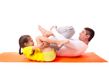 Fototapeta na wymiar dad practicing yoga with daughter isolated