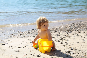 Boy playing on beach