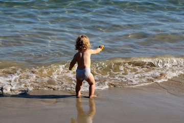 Small boy in sea water