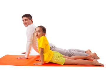 Fototapeta na wymiar dad practicing yoga with daughter isolated