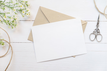 Blank white greeting card with brown envelop - Powered by Adobe