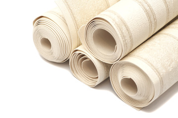 Roll of vinyl wallpapers on white background