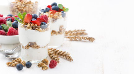 healthy dessert with natural yogurt, muesli and berries