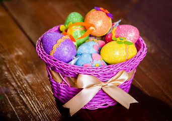 easter eggs in violett basket