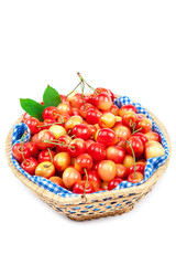 Ripe sweet cherry in a wicker basket.