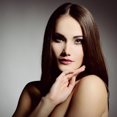 Naklejka premium Portrait of very pretty young woman. Image toned.