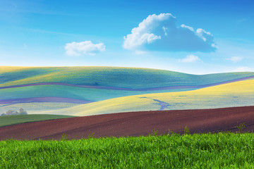 Obraz premium Lanscape of Colorful fields in beautiful striped hills in minim