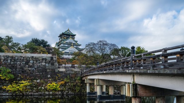 4K Time-lapse Movie of Morning cloud over Osaka Castle during Cherry Blossoms season in Osaka, Japan.