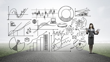 Businesswoman sketching her ideas