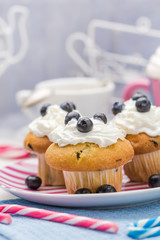 Sweet delicious muffins cream cranberries