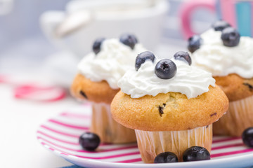 Sweet delicious muffins cream cranberries