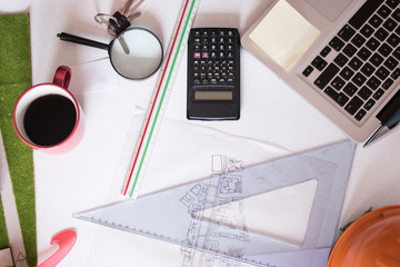 Projecting with pencil on the big urban drawings. Town planning