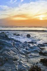 Fototapeta na wymiar grey rocks at rocky beach