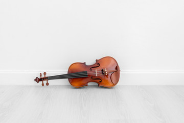 Classical cello on white wall background with copy space.