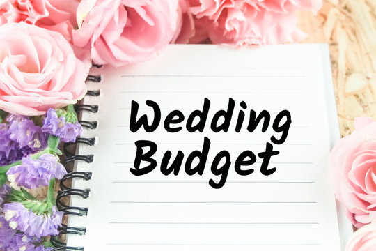 Word Wedding Budget On Note Paper Pink Flower Background