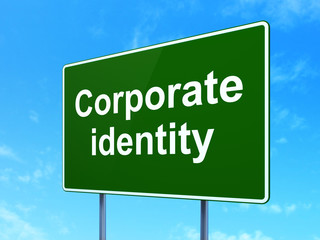 Finance concept: Corporate Identity on road sign background