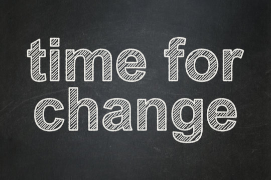 Time concept: Time for Change on chalkboard background