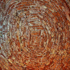 background of old red brick circular masonry