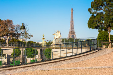 Fototapeta na wymiar Tuileries Garden with the Eiffel Tower in the summer morning, Pa