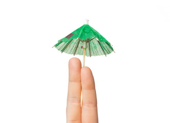 close up of two fingers with cocktail umbrella