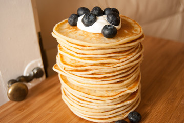 pancakes with soured cream and blueberries