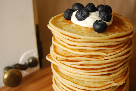 pancakes with soured cream and blueberries