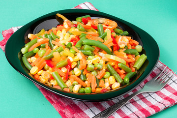 raw vegetable mix on the yellow plate