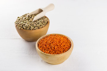 Various bean on white wooden background