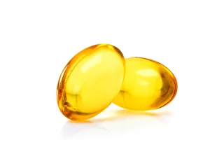 Foto auf Acrylglas Fish oil supplement capsule isolated on white background © F16-ISO100