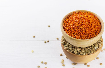 Various bean on white wooden background