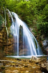 The beautiful waterfall in forest, spring, long exposure