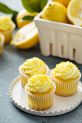 Lemon cupcakes with bright yellow frosting