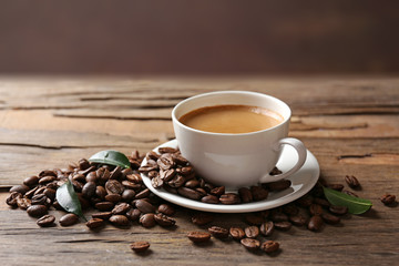 Cup of coffee on wooden table