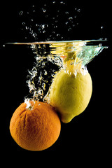Lemon and orange falling