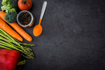 Vegetables on slate table   © chandlervid85