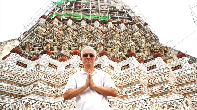 Tourist visiting Temple of Dawn or Wat Arun in Bangkok, Thailand. landmark destination