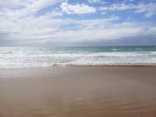Fototapeta na wymiar Atlantic Ocean Beach On Cloudy Day