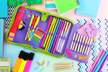 Pencil case with various stationery, close up