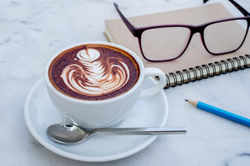 Cup of coffee on a rock table