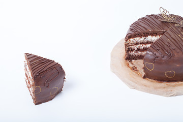 Chocolate homemade cake with gold decor