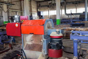 Sawmill. The process of cutting logs into boards. Automatic line sawing