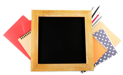 Small school blackboard with stationery isolated on white