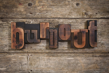 burnout written with letterpress type