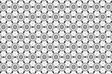 Black-and-white ornament with different elements. 
23