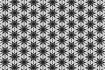 Black-and-white ornament with different elements. 
22