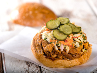 Pulled Pork Sandwich on White Wooden Table
