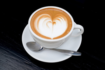 hot mocha in a white cup on table