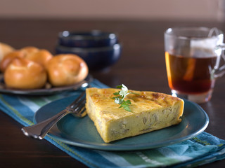 Slice of cheese and onion quiche