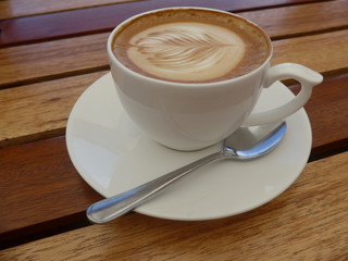 Coffee cup on a wooden table