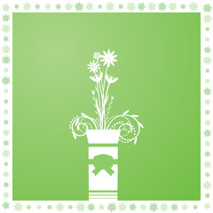 Flowers in a vase.Original flowers ornament on green.